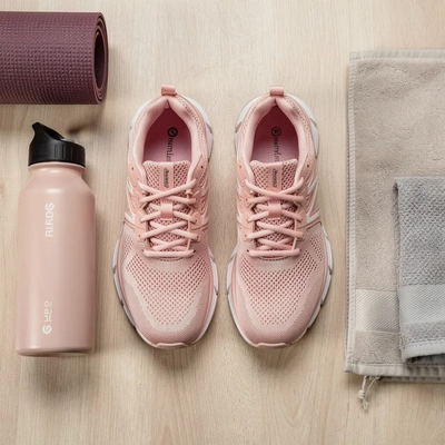 Women's Pink Training Shoes — Flat Lay Overhead Shot, Premium Lifestyle style product photography